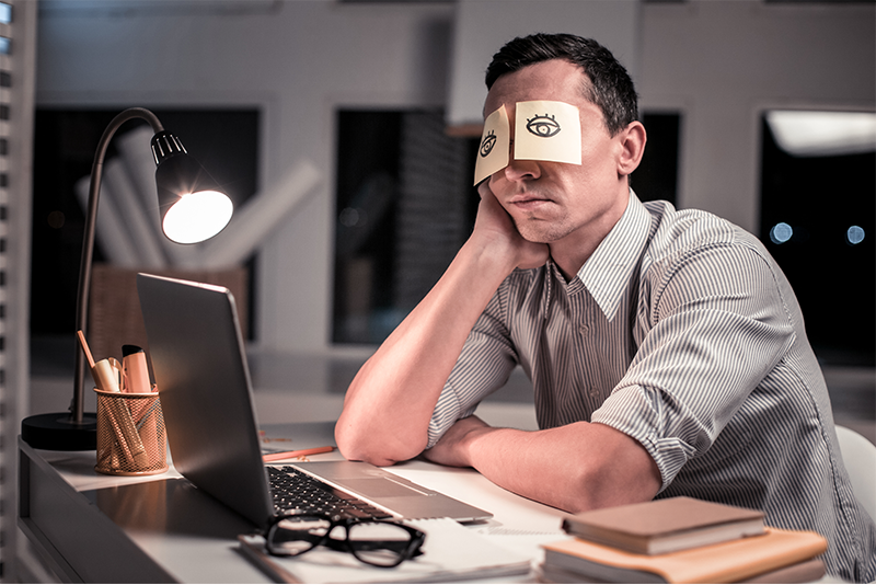 Person working with concentration at desk